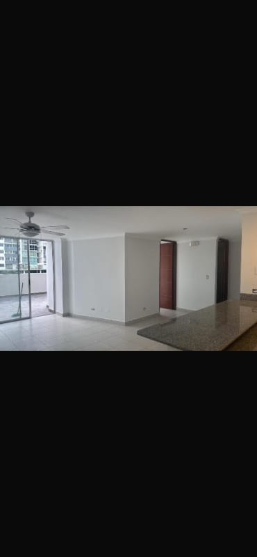 Granite countertop kitchen with cabinets and tile flooring in PH Central Park Panama