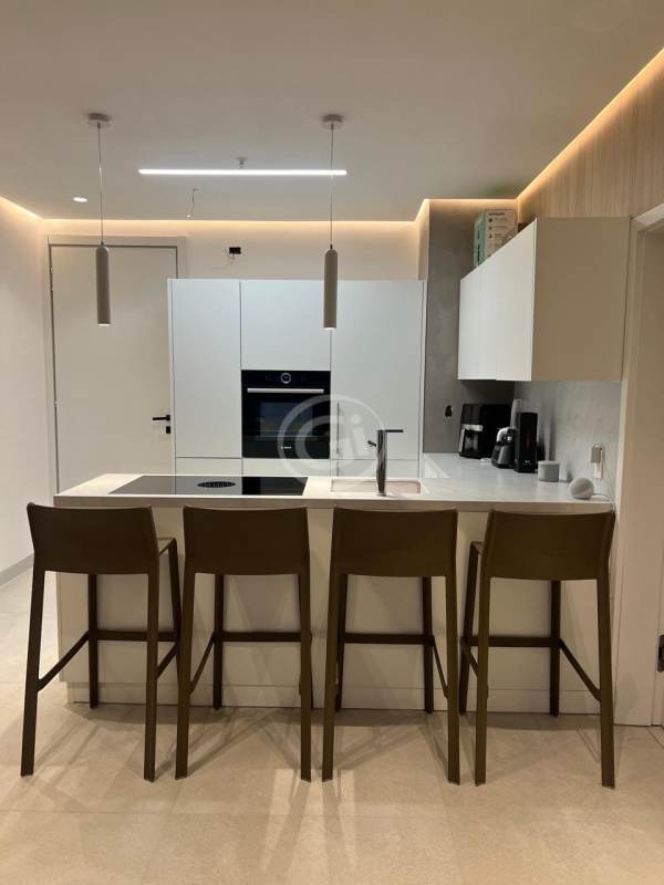 Modern private cinema with reclining seats and LED ambient lighting in PH Ocean House Panama