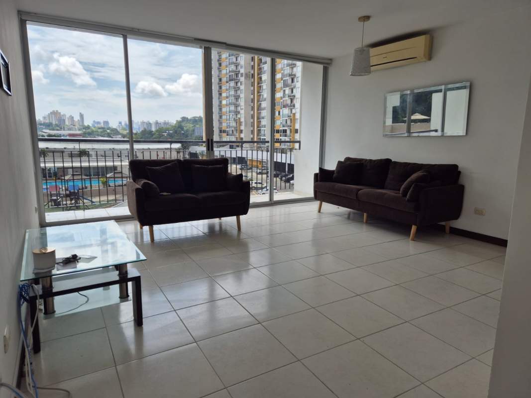 Functional kitchen with granite countertops and white cabinets in PH Altavista Towers El Bosque Panama