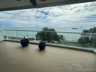 Glass railing balcony overlooking Pacific ocean beachfront condo Amanecer Panama