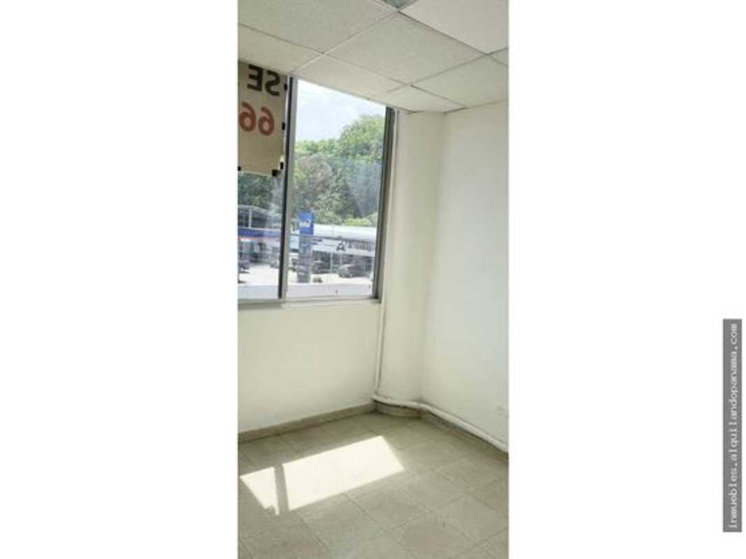 Small office space with large window tiled floor and white walls at Altos del Chase Betania Panama