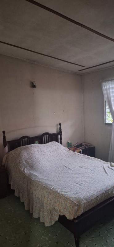 Hallway with tile floor wood ceiling traditional style spacious home in Panama