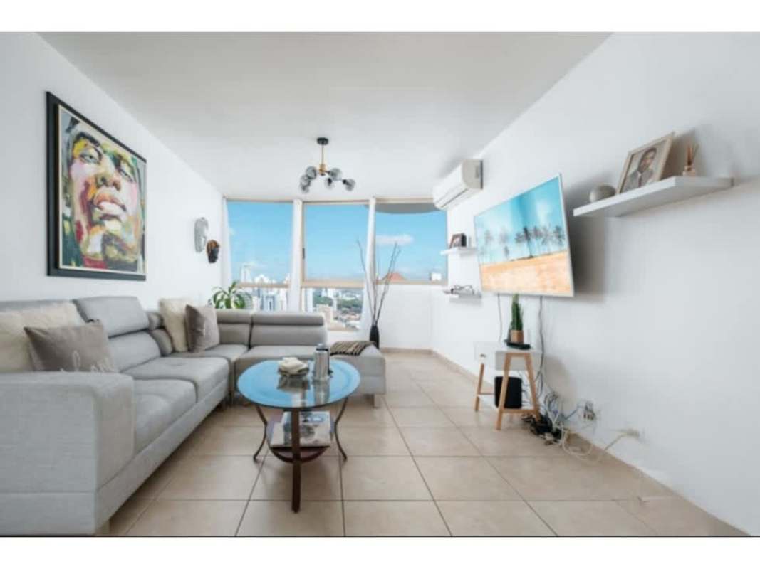 Modern kitchen with wood cabinets, granite counters and appliances in PH San Francisco Bay Panama City