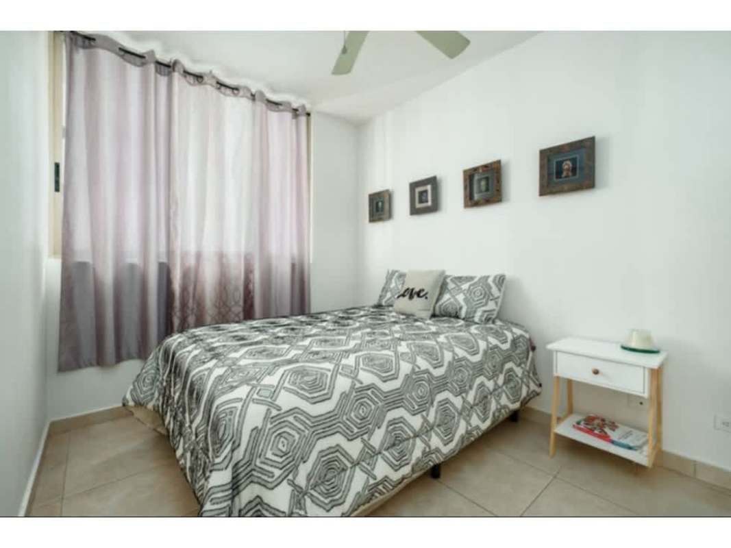 Bedroom with city views large windows and minimalist decor in PH San Francisco Bay Panama