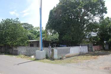 Fenced street corner lot with mature trees ideal for commercial development in Arraiján Panama