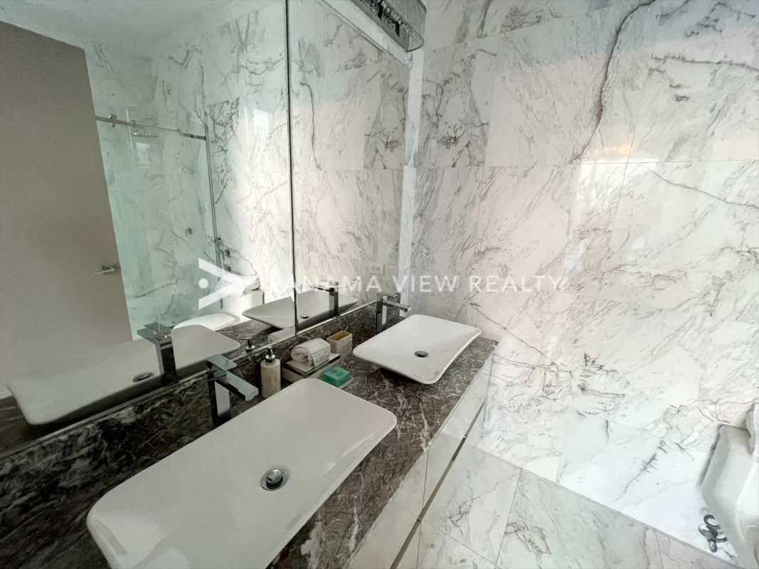 Master bedroom panoramic windows Pacific Ocean skyline PH Regalia Costa del Este Panama