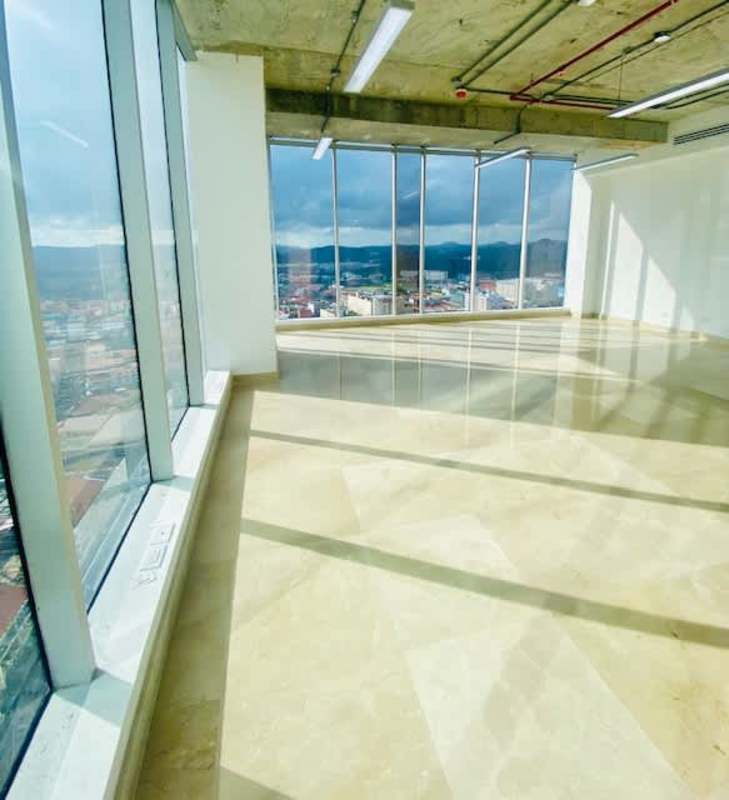 Spacious empty commercial office space with marble floors and panoramic view in Balboa Office Center