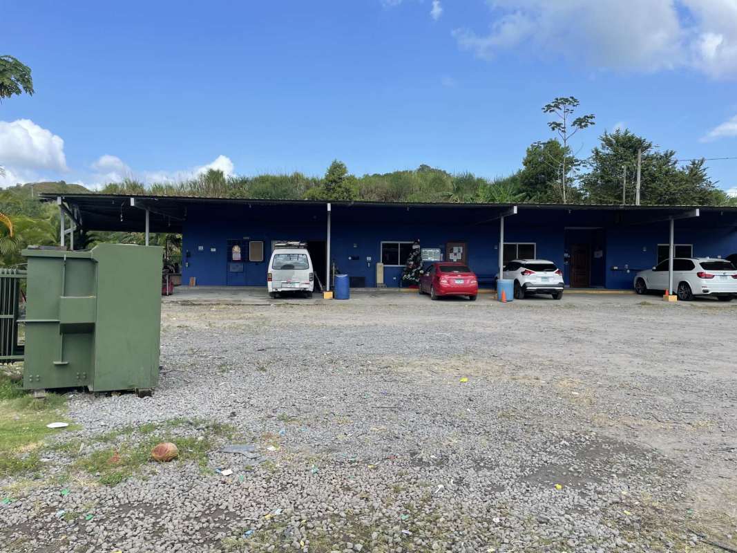 Outdoor employee cafeteria area covered with metal roof at office complex for sale Brisas del Golf Panama