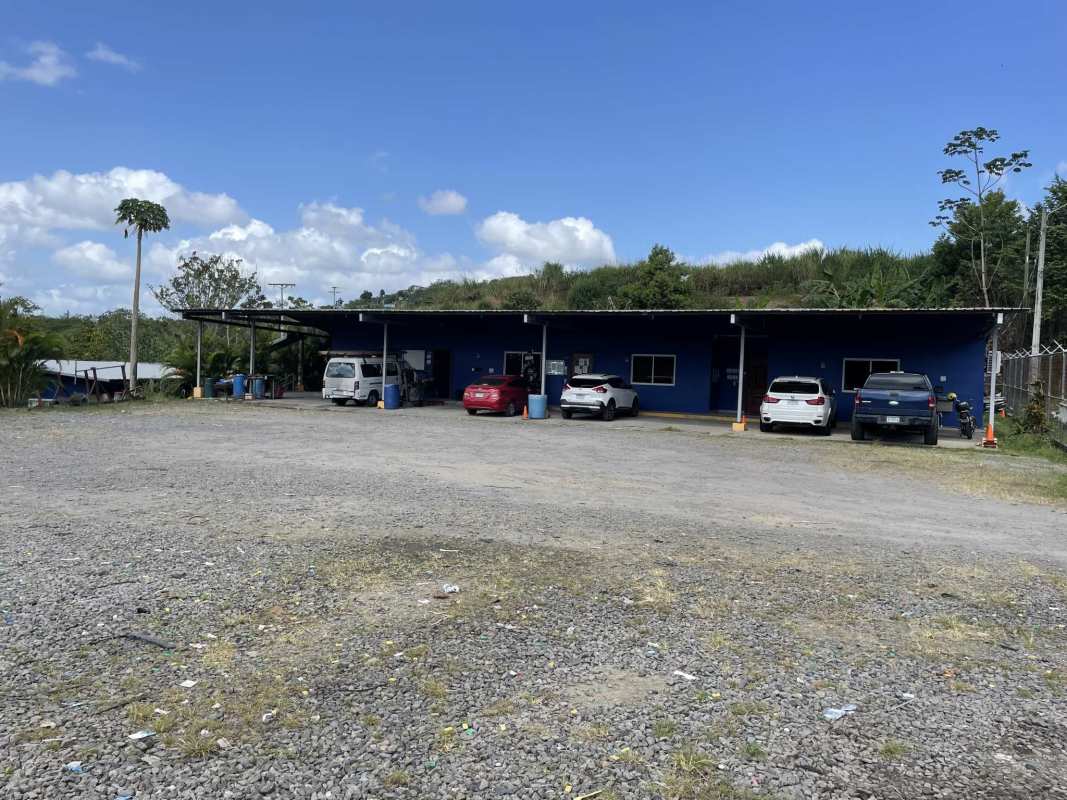 Spacious parking area inside commercial complex in Brisas del Golf Panama with gravel lot