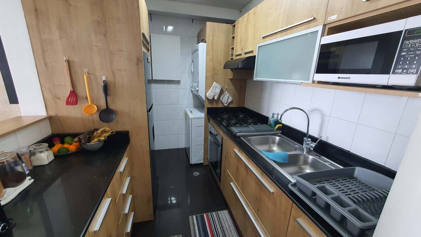 Bedroom with built-in wooden wardrobe AC and natural light PH Majestic Gardens Panama