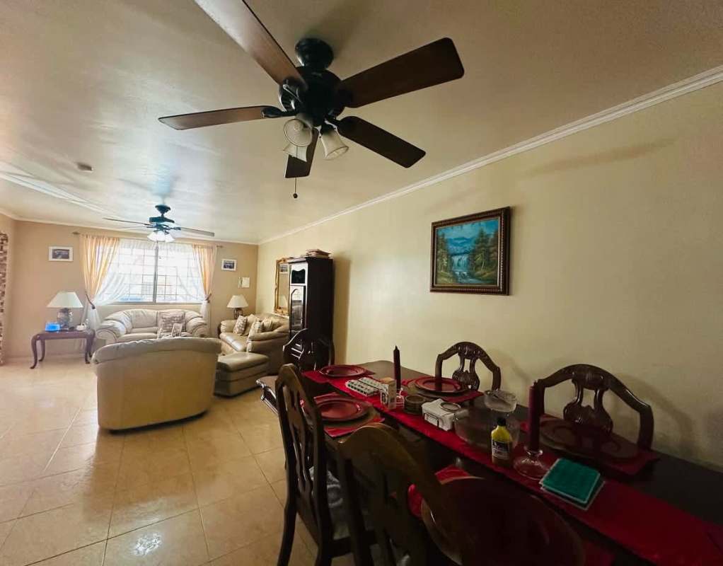 Traditional dining with cream sofas, decorative lighting Panama