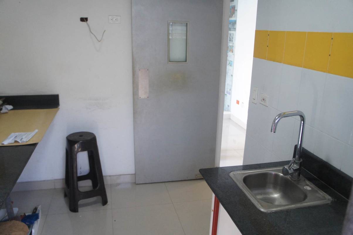 Compact kitchen sink area with tiles Betania Panama office