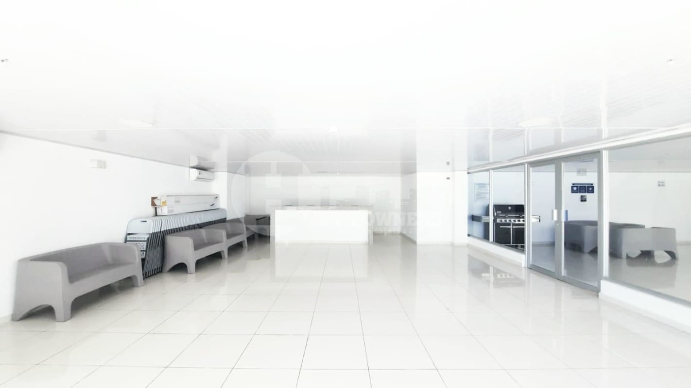 Spacious minimalist white rooftop social lounge event room PH Vista Park Panama