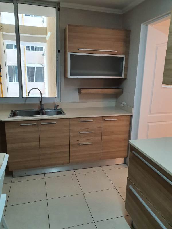 Minimalist design kitchen double sink natural light PH Royal Pacific Punta Pacifica Panama