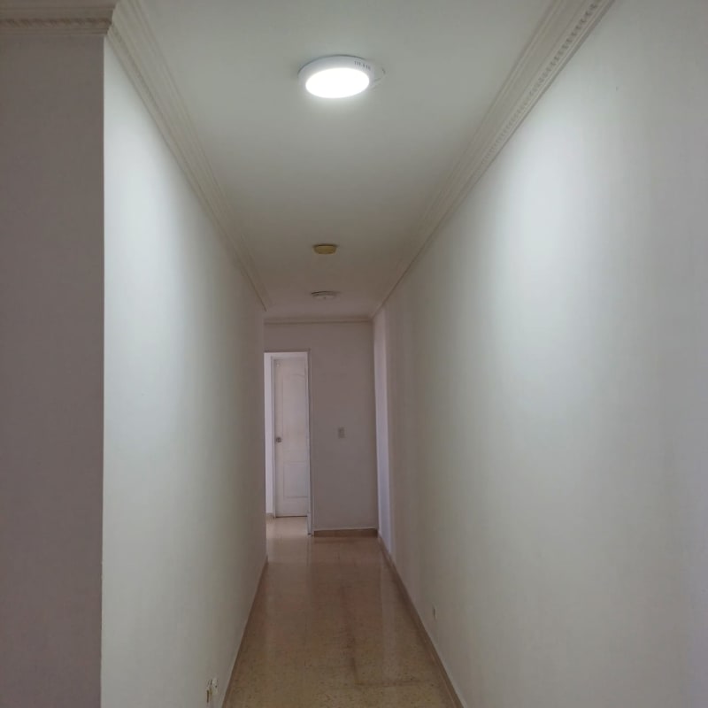 Bright hallway with recessed lighting in ocean view apartment San Francisco Panama City