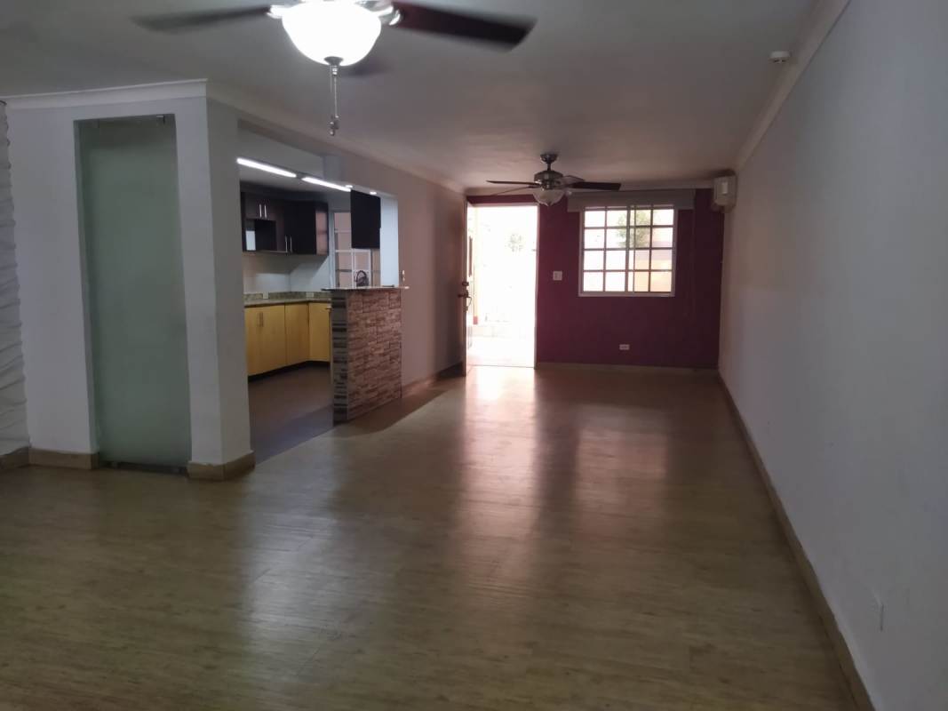 Kitchen with granite countertop and tiled backsplash in Betania Panama City house for sale