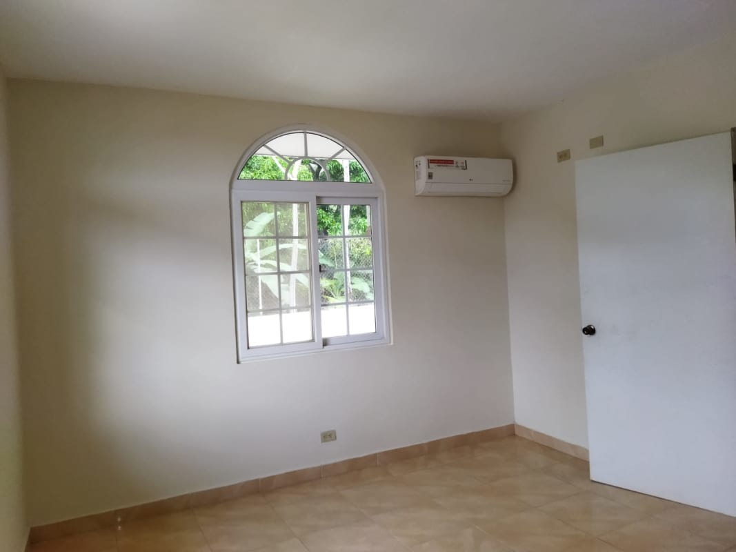 Spacious bathroom with bathtub glass shower enclosure and checkered tiles Las Cumbres Panama