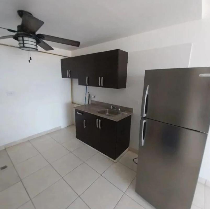 Affordable kitchen with cabinetry and fridge space PH Altos de Panamá Panama