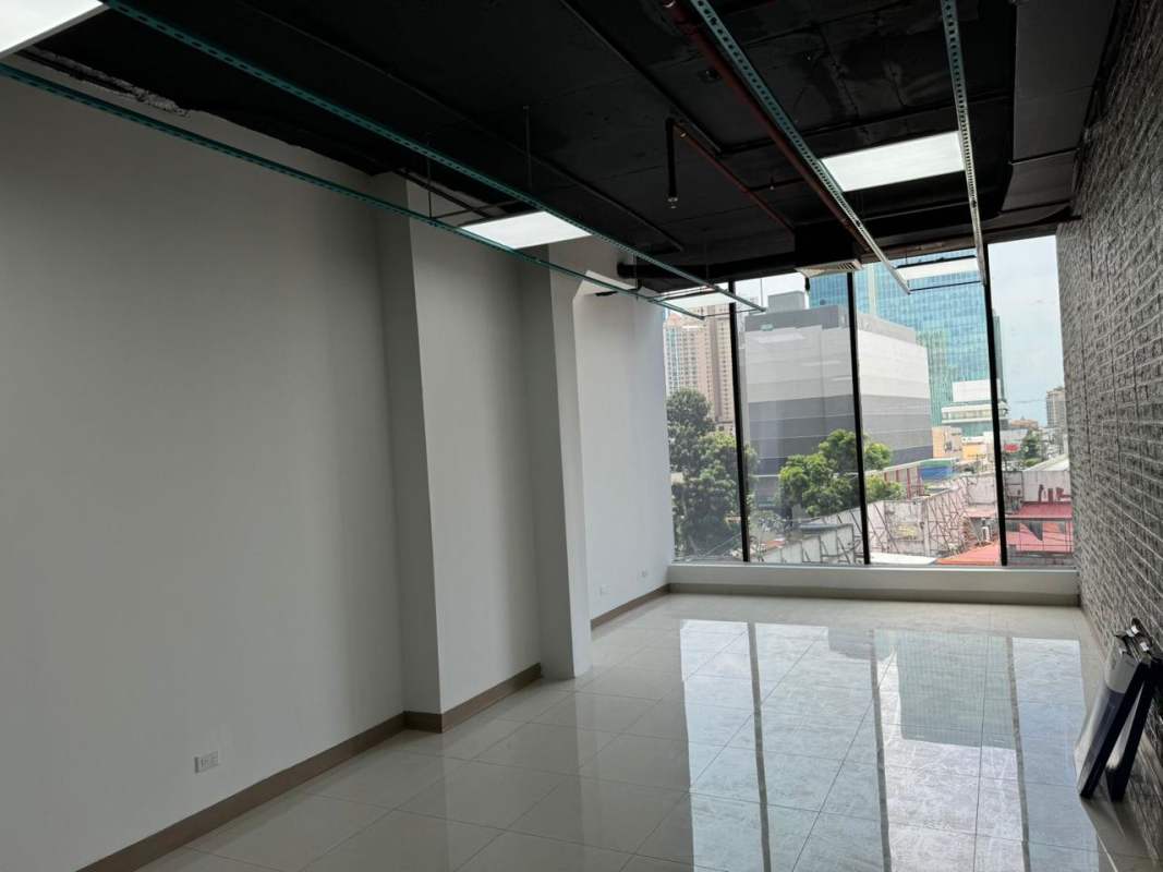 Spacious empty office space with large windows and city skyline view for rent in Ocean Business Plaza Punta Paitilla Panama