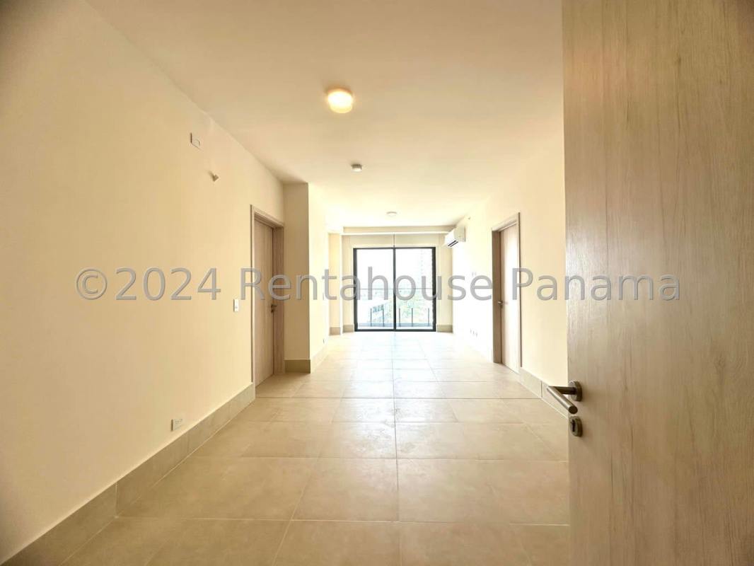 Bright living room with large sliding doors to balcony Santa Maria Panama