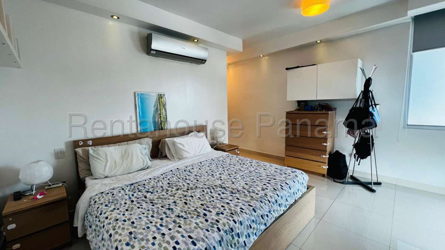 Kids bedroom with colorful accents, bright daylight, and city views in PH Keops Panama