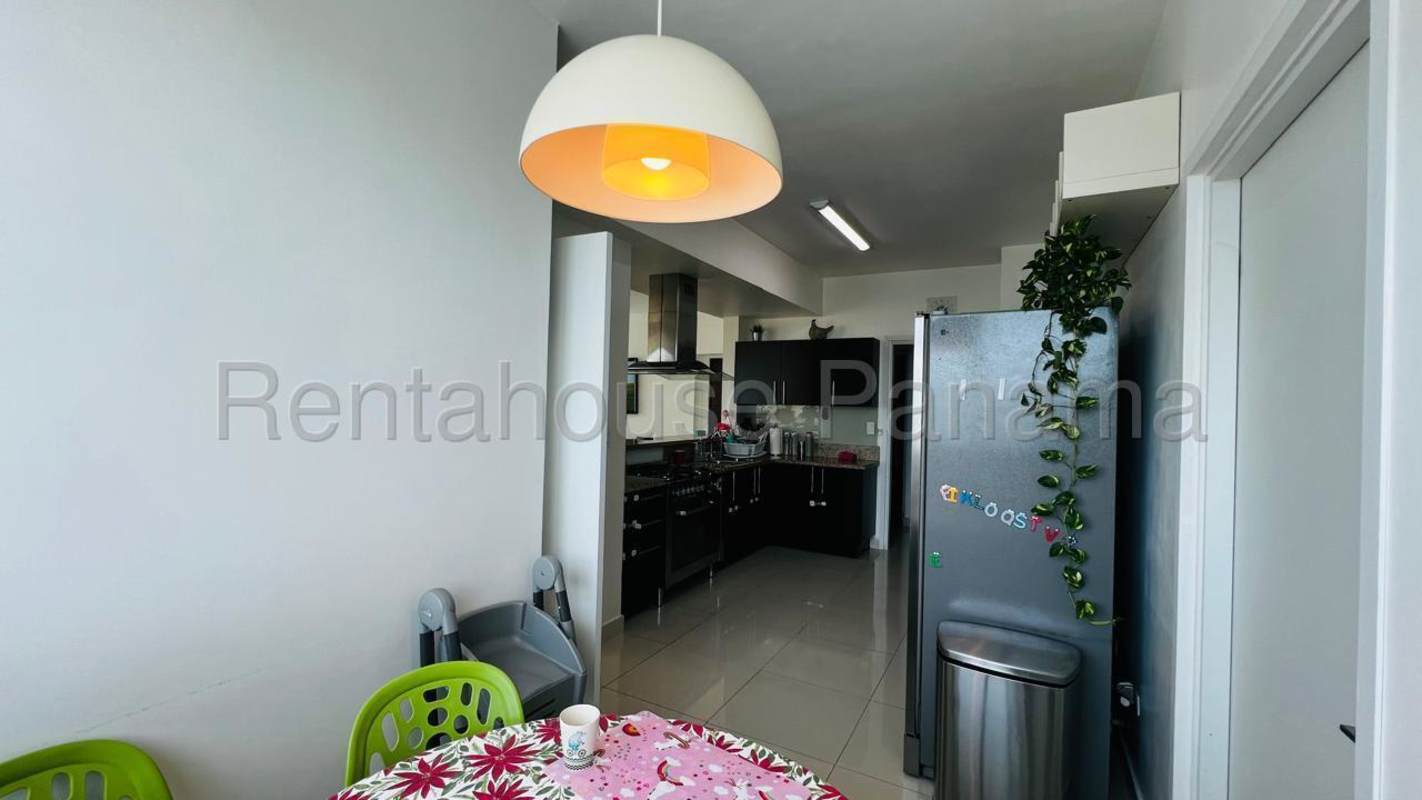 Bedroom featuring ensuite bath, large windows with ocean view at PH Keops San Francisco