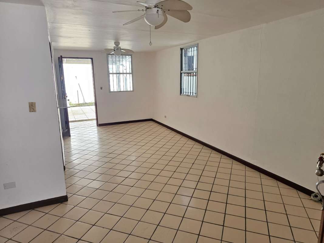 Bright open living dining room with tiled floor, ceiling fan in Condado del Rey Panama