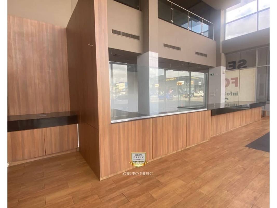 Interior view staircase mezzanine wood and glass railing in Panama commercial property rental