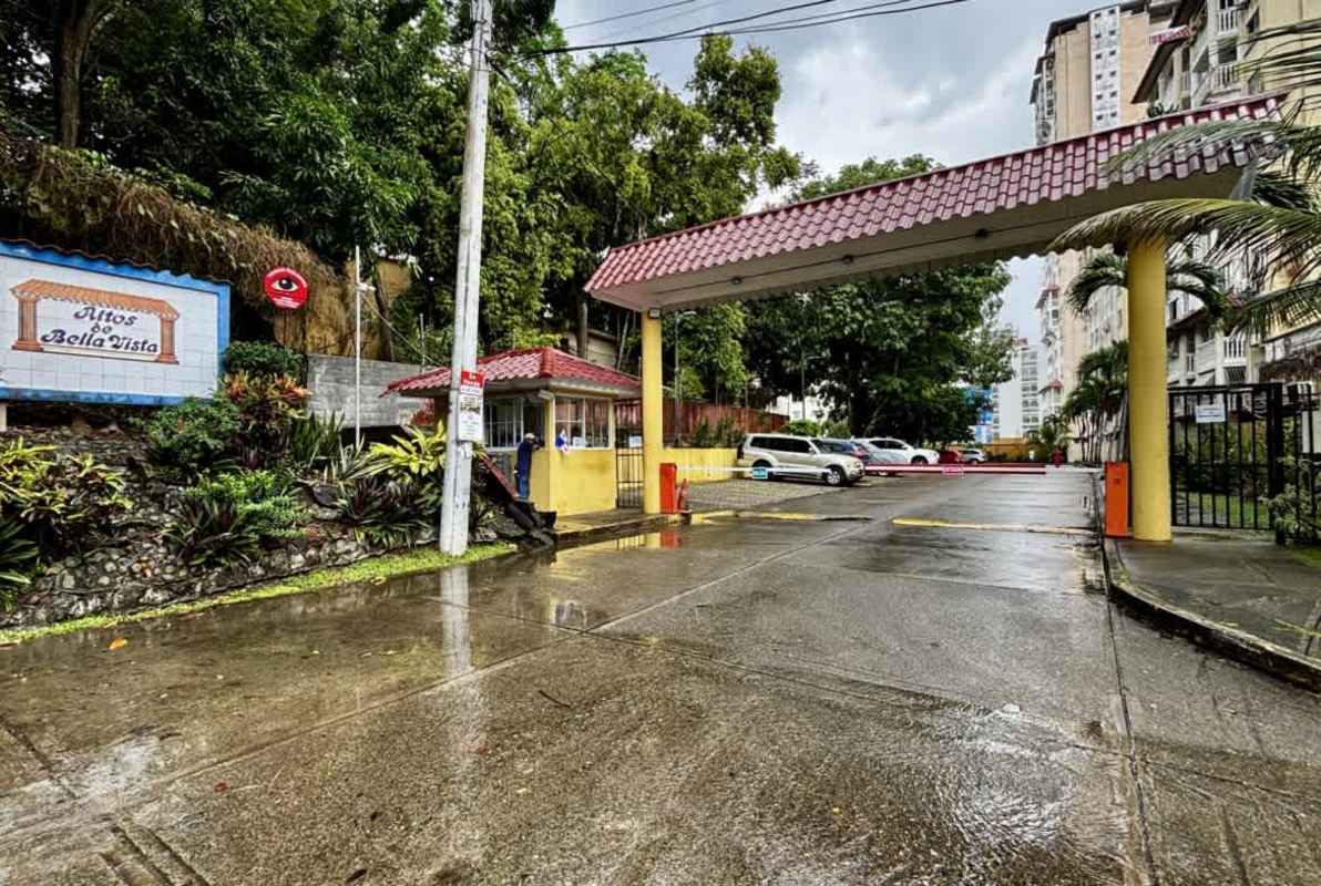 Exterior of PH Altos de Bella Vista showing gated security entrance and apartments Panama City