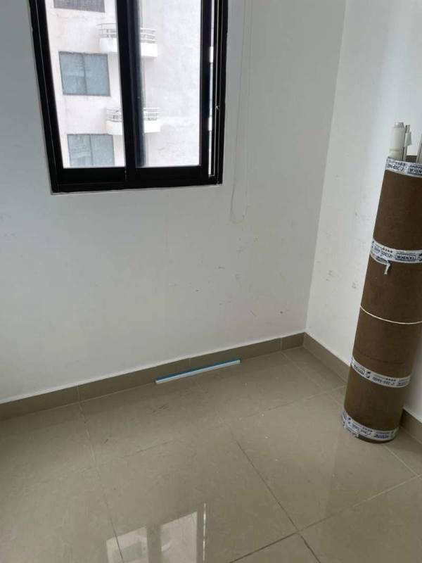 Bright living room with glossy tile floors and balcony access in PH San Francisco Bay Panama City