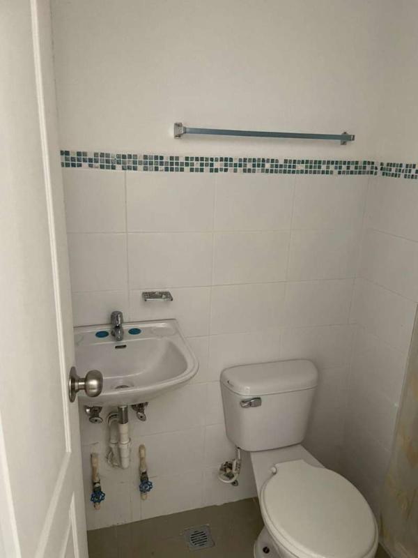 Second bedroom with built-in closet and large window PH San Francisco Bay Panama