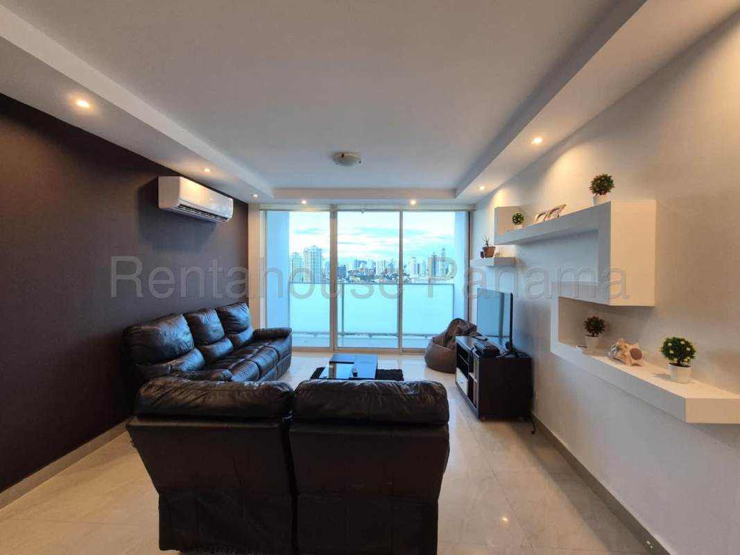 Living area with large window and skyline views Punta Pacifica Panama