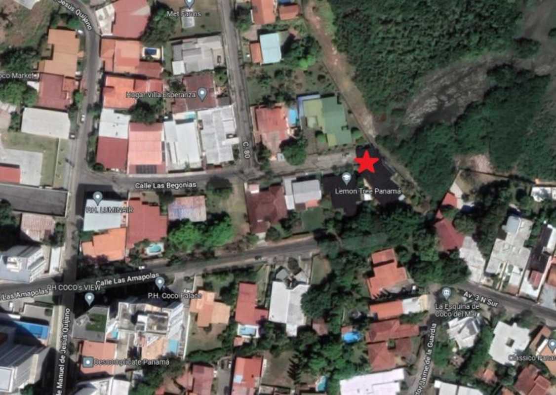 Classic dining room with chandelier and marble floors in waterfront house Coco del Mar Panama