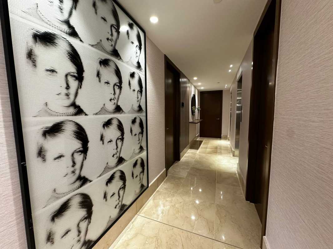 Elegant bedroom with floor to ceiling window overlooking golf course Santa Maria Panama