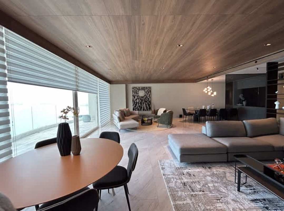 Modern kitchen with marble countertops island and stainless appliances PH The Towers Punta Paitilla