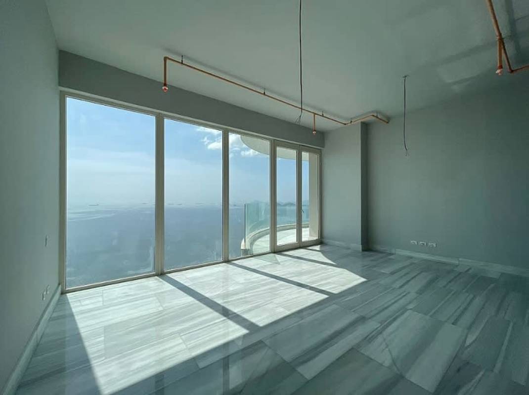 Spacious modern kitchen with island and marble finishes PH The Towers Punta Paitilla