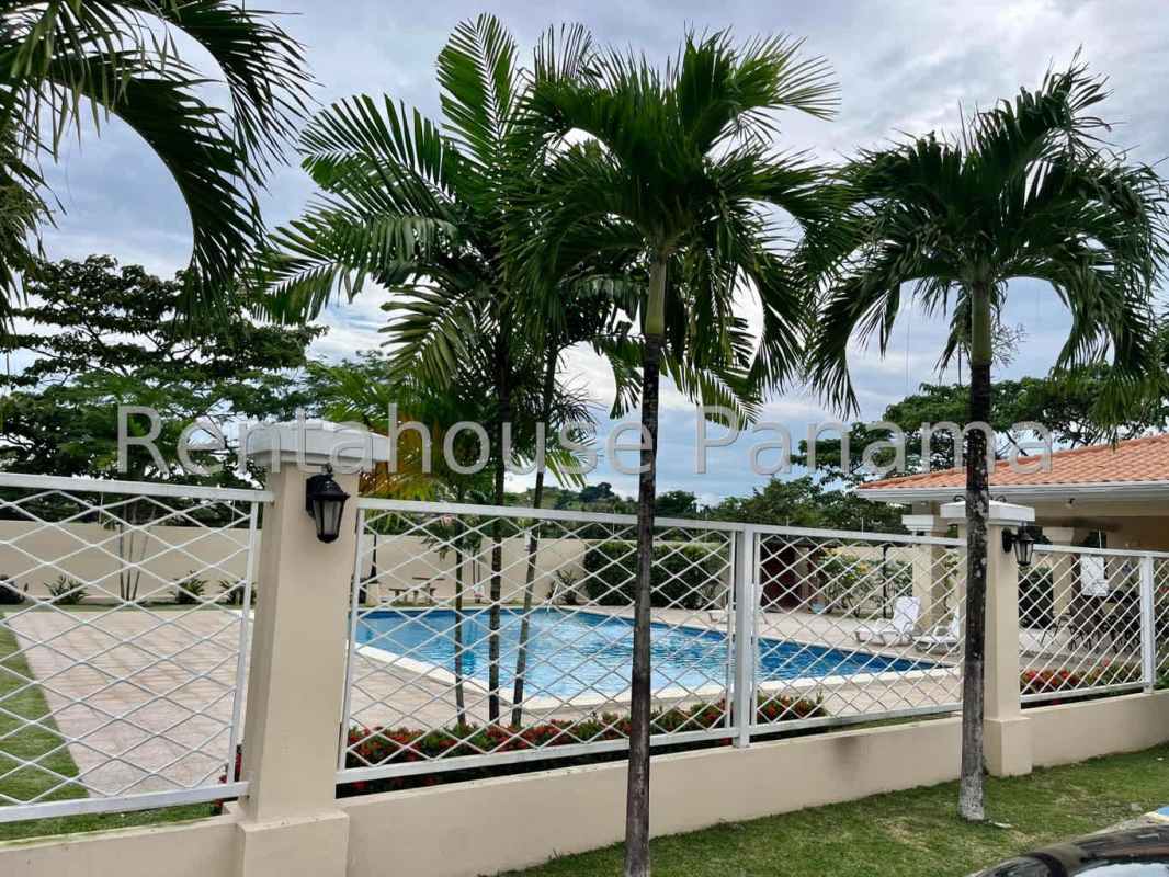 Swimming pool and children's playground in Villa Tivoli Brisas del Golf Panama