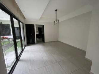 Modern bathroom with glass shower and vanity PH Nativa house rental Panama Pacifico