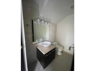 Upstairs family room or den with large windows PH Nativa Panama Pacifico