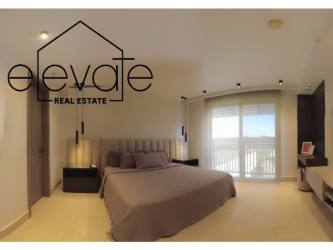 Modern multi-story condo with balconies and underground parking PH Explora Panama Pacifico