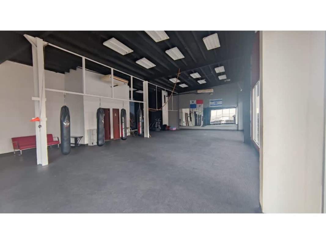 Modern commercial center facade with storefronts and parking Plaza 75 San Francisco