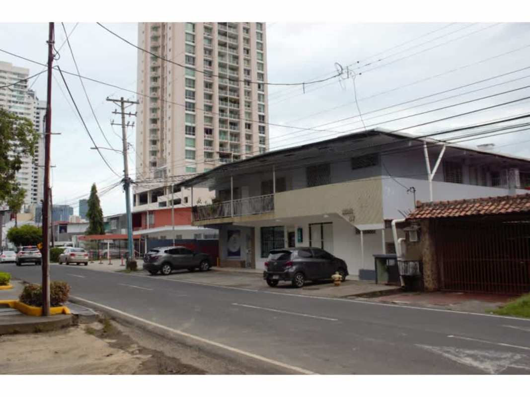 View of balconies overlooking private courtyard in mixed-use low-rise building Panama