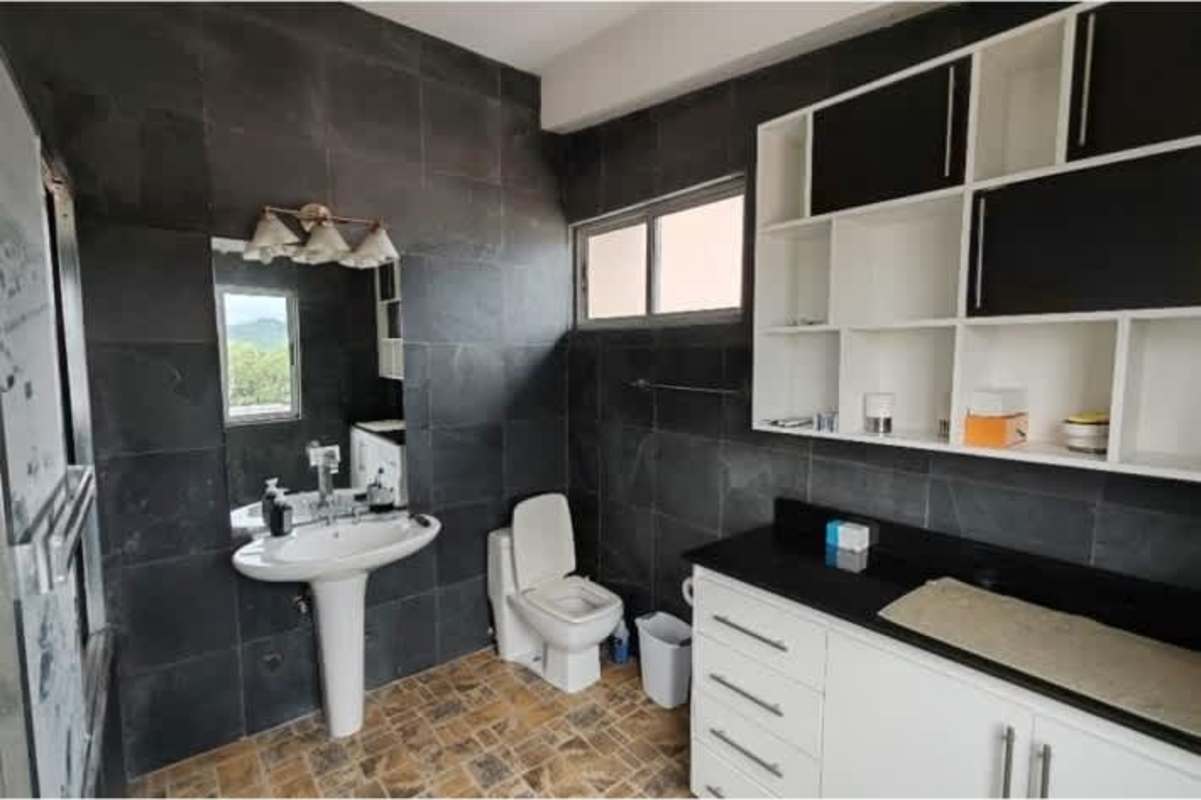 Living room with floor to ceiling windows city skyline view PH Terrazas La Cresta Bella Vista