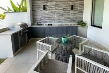 Gourmet kitchen with granite countertops, stainless appliances Laguna Townhomes Buenaventura Panama