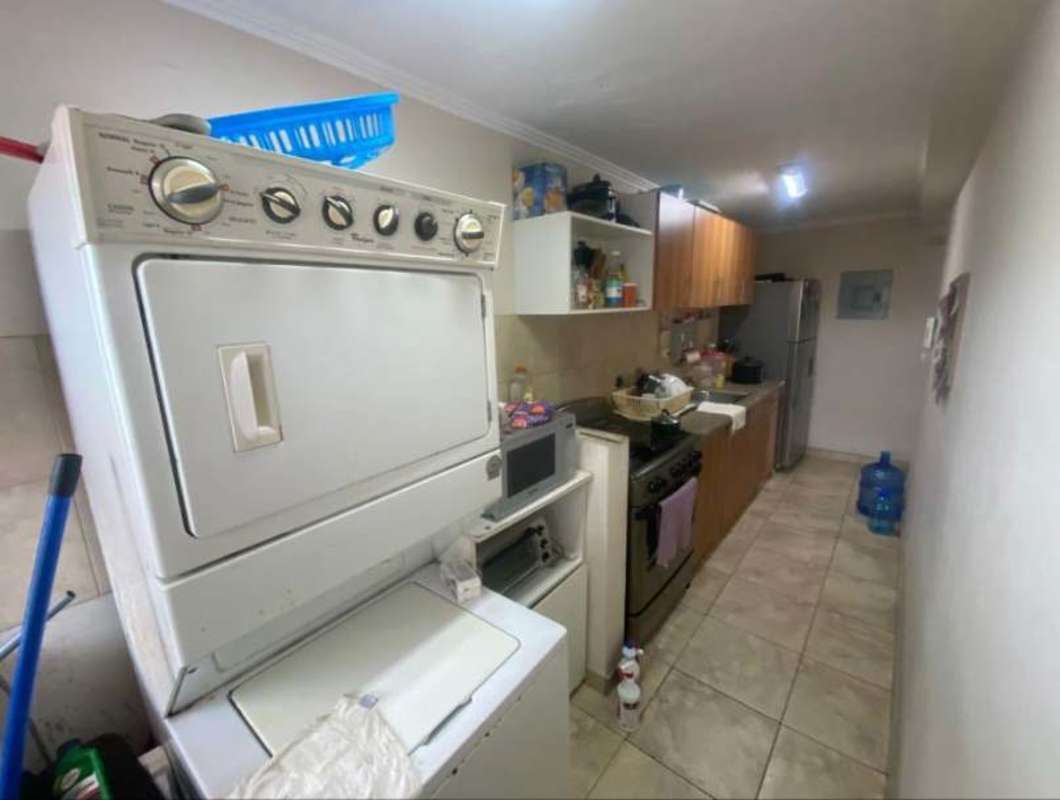 Tile bathroom with pedestal sink and shower in PH Los Girasoles Panama City Panama