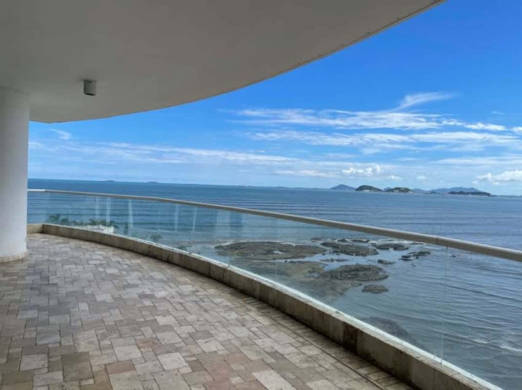 Expansive dining space with marble floors and oceanfront windows at The Point, Punta Paitilla