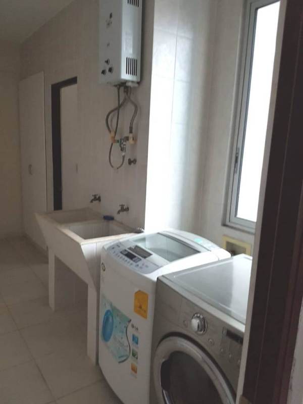 Master bedroom with large windows and panoramic ocean skyline view in Pacific Village Panama