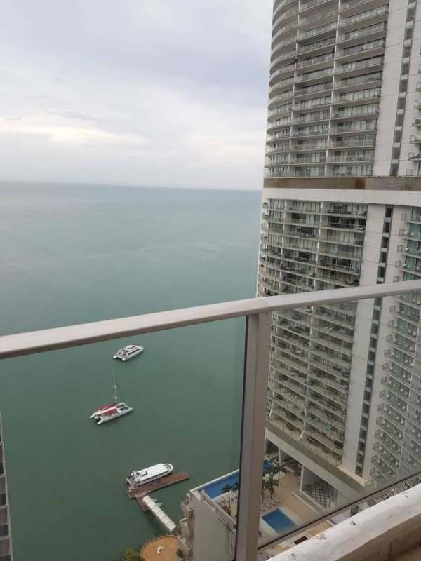 Spacious kitchen with granite countertops, wood cabinets, appliances in Pacific Village Punta Pacífica