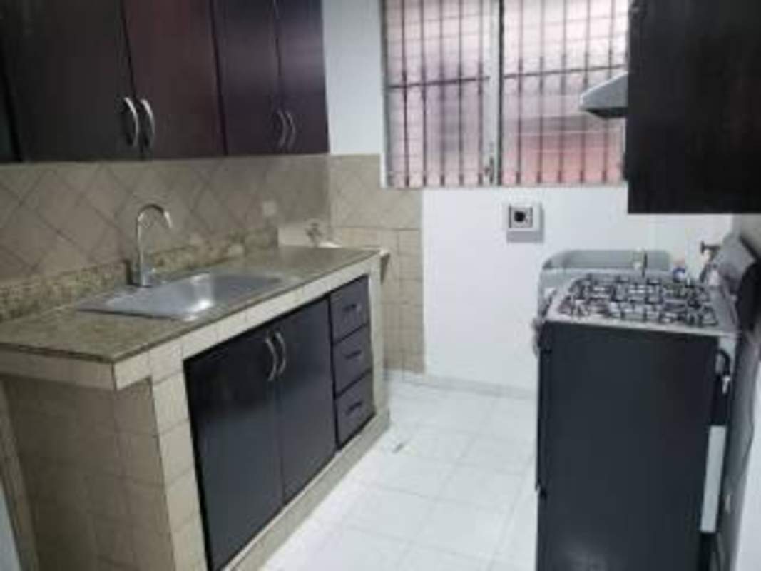 Affordable apartment modern kitchen granite counters tile backsplash for sale in Bella Vista Panama