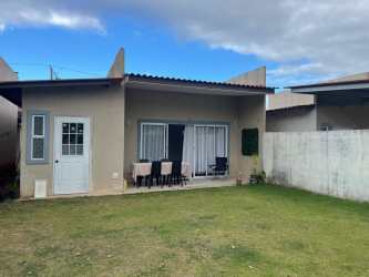 Fenced backyard with patio and garden area in Villas de Arraiján Panama Oeste